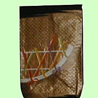 黒にキンキラ模様の帯