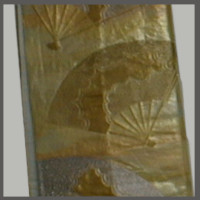 金色の扇模様の帯